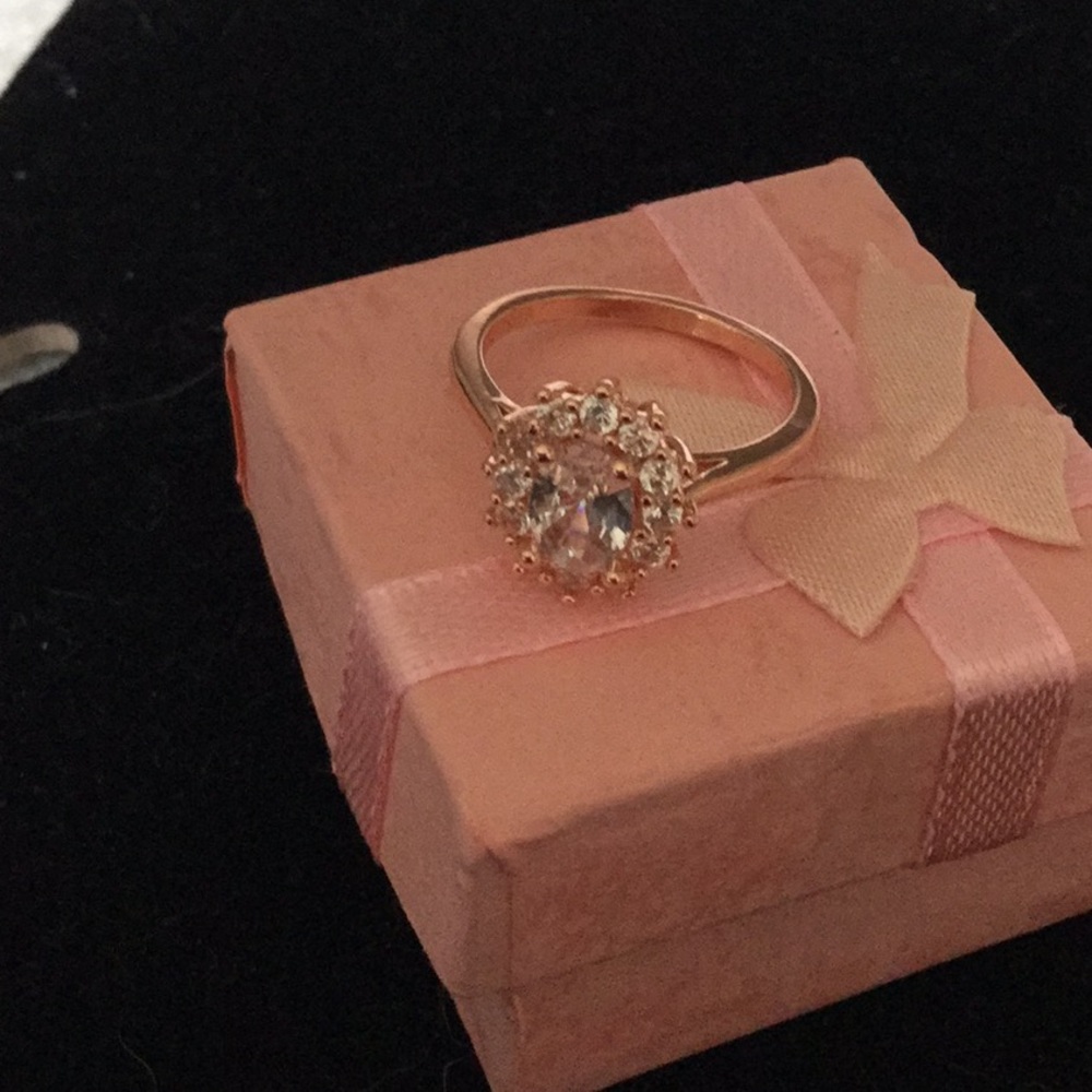 Rose gold ring with white sapphires size 5